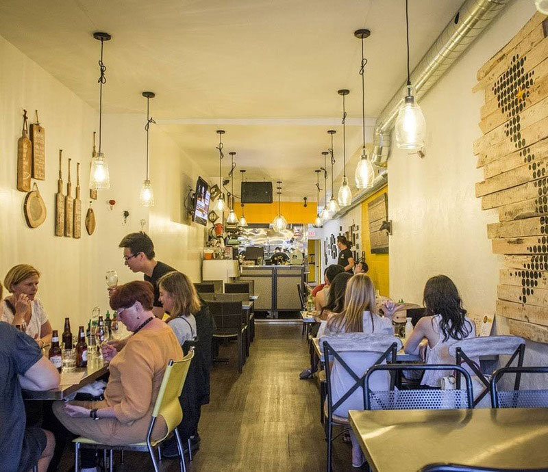 Women eating in bright interior