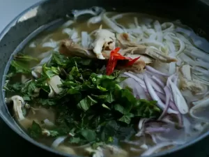 A bowl of soup with noodles