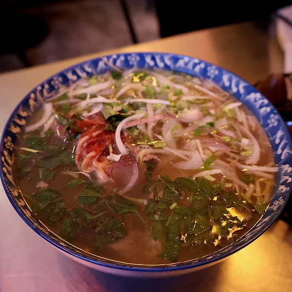 Pho with red meat and veggies