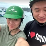 A couple with bike helmets