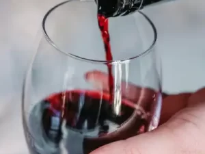 Red wine being poured