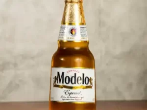 A bottle with brown beer