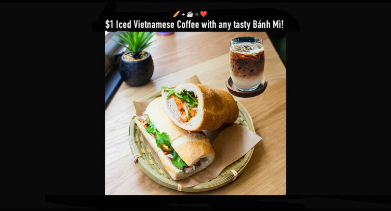 Iced coffee and a sandwich on a table